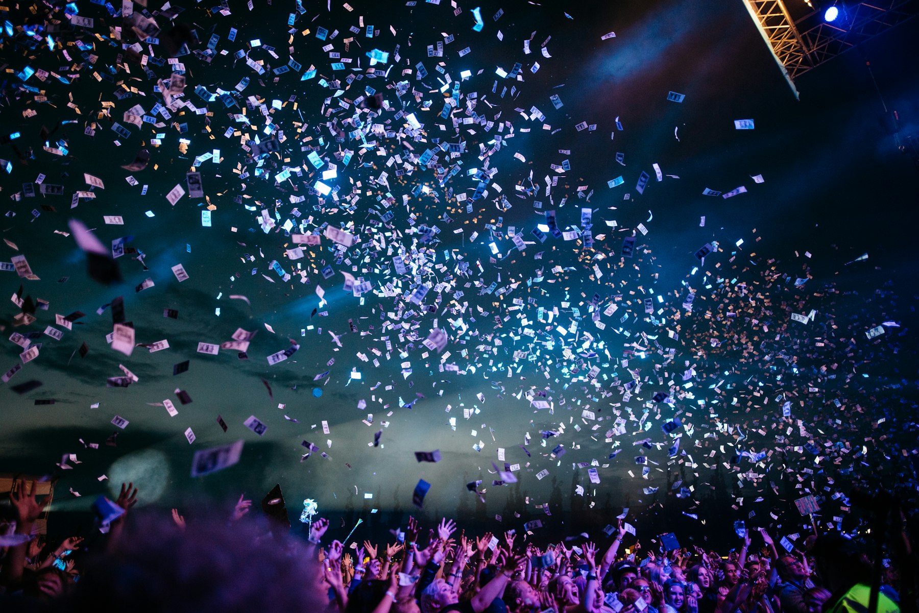 Stand-in photograph of a celebration crowd at night.